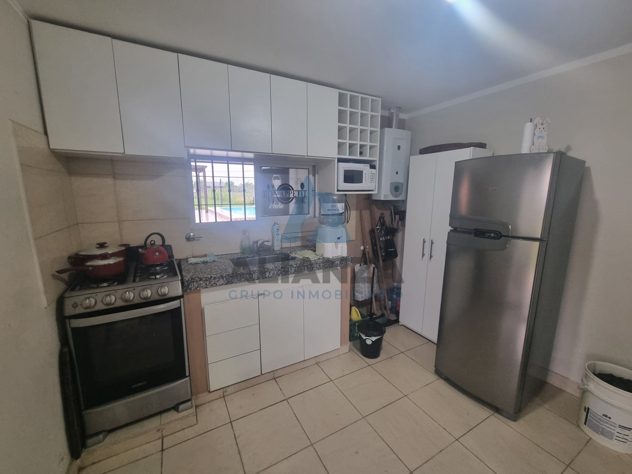 CASA EN VENTA A ESTRENAR DE DOS (2) DORMITORIOS EN BARRIO AMPLIACION EL MOLLAR 2, CON QUINCHO Y PILETA