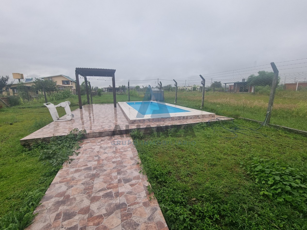 CASA EN VENTA A ESTRENAR DE DOS (2) DORMITORIOS EN BARRIO AMPLIACION EL MOLLAR 2, CON QUINCHO Y PILETA