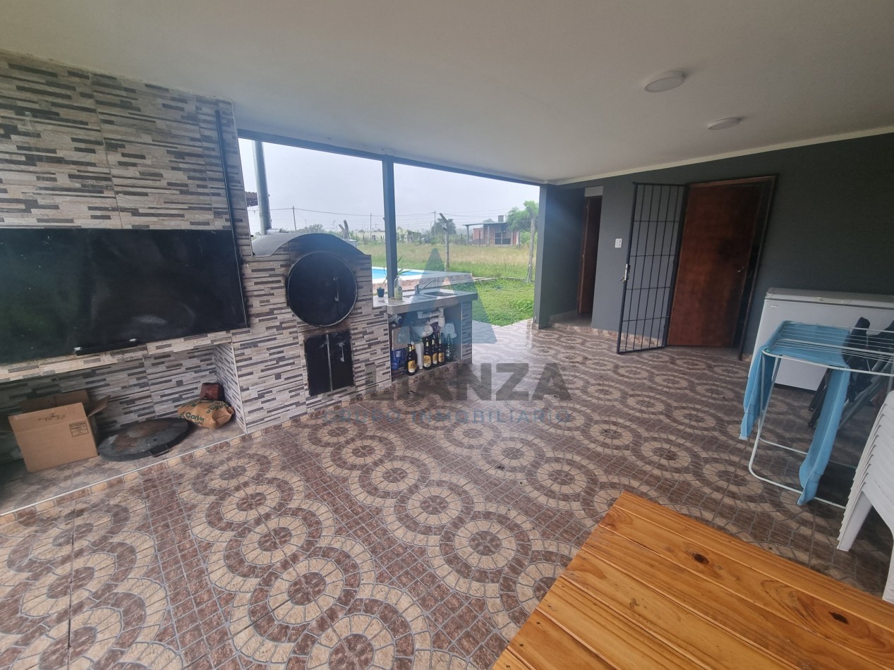 CASA EN VENTA A ESTRENAR DE DOS (2) DORMITORIOS EN BARRIO AMPLIACION EL MOLLAR 2, CON QUINCHO Y PILETA